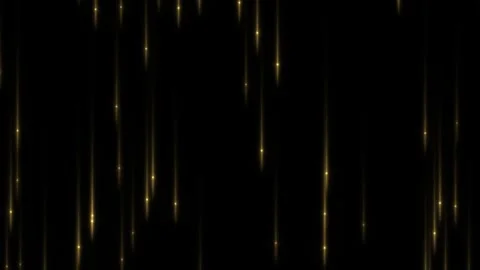 Falling golden lights create visual effects on a black Stock Footage 338300599