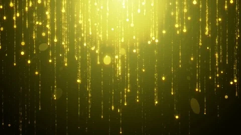 Falling golden particles rotate flicker and shimmer against a black background Stock Footage 75249447