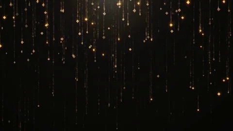 Falling golden particles rotate flicker and shimmer against a black background Stock Footage 75656660