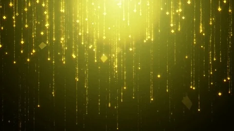 Falling golden particles rotate flicker and shimmer against a black background Stock Footage 75656956