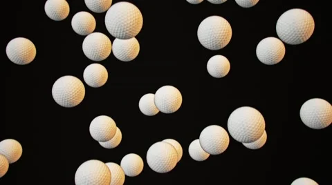 Falling Golf Balls Against Black 库存影片 65992641