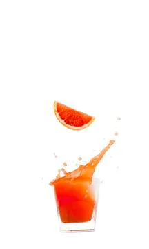 Falling grapefruit in juice splash collection on a white background. 写真素材
