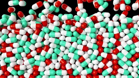 Falling green and red capsules on black background. 3d medical supplement Stock Footage 316225243