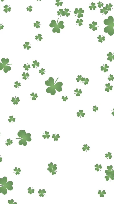 Falling green shamrocks animation on white background for St. Patrick's Day. Stock Footage 328691992