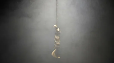 Falling Hangman Noose over black background Stock Footage 34505825