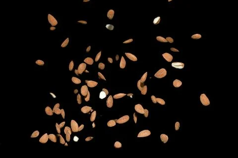 Falling heap of almonds Foto stock