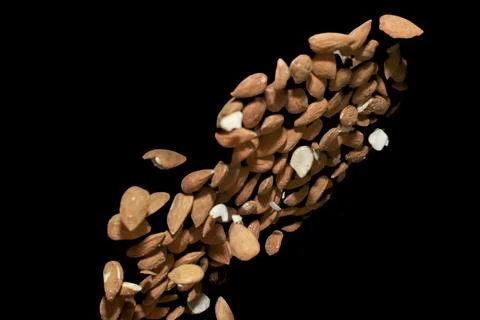 Falling heap of almonds Foto stock