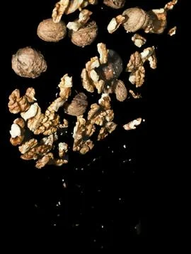 Falling heap of walnuts Stock Photos