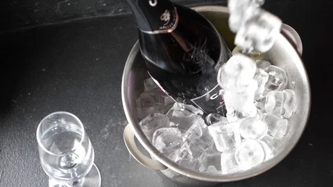 Falling ice on a bottle of champagne Stock Footage 101125478