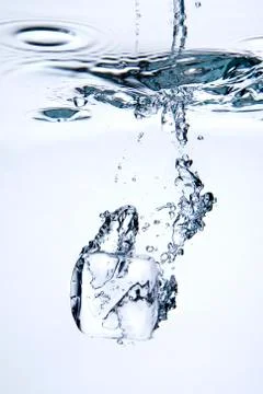 Falling Ice Cube Stock Photos