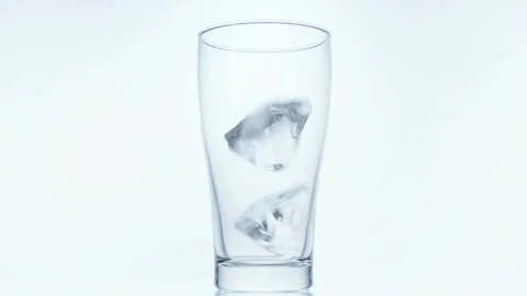 Falling Ice in a Glass Video stock 327402651