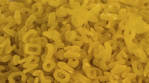 Falling Letter &amp; Number Soup Slow Motion 1500fps Macro Stock Footage 119253329