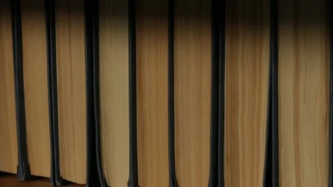 Falling light from the window on the bookshelf. Stock Footage 170386569