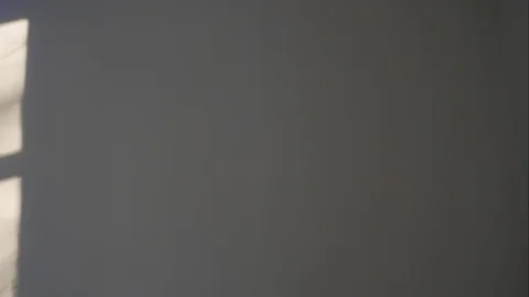 A falling light from a window moving along the wall. Stock Footage 86696688