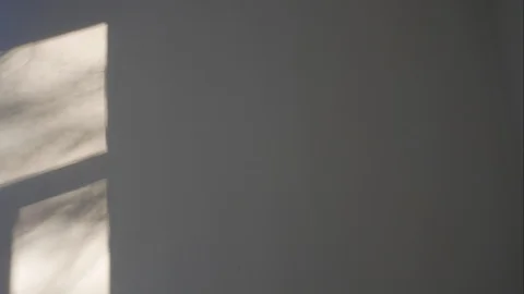 A falling light from a window moving along the wall. Stock Footage 86698382