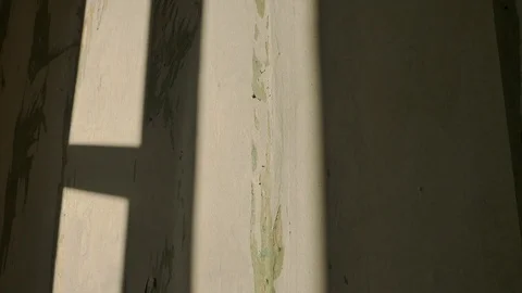 A falling light from a window moving along the wall. Stock Footage 122232924