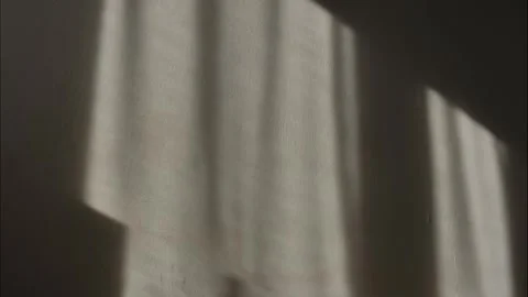 A falling light from a window moving along the wall. Video stock 305272605