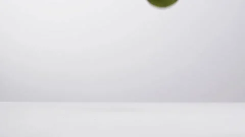 Falling a lime on the ground Stock Footage 132861451
