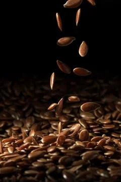 Falling linseeds middle Stock Photos