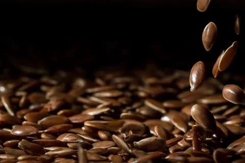Falling linseeds right side Stock Photos
