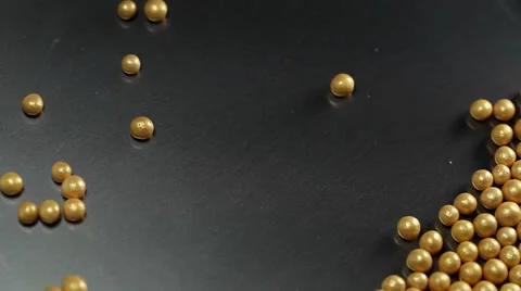 Falling little yellow balls Stock Footage 36003938