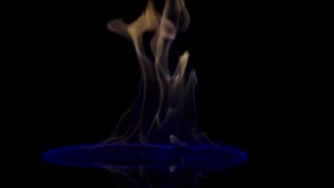 Falling match causes flames to ignite against black studio background Stock Footage 165898822