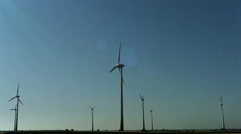 Falling meteorite on the wind generators field Video stock 44707259