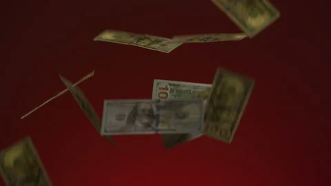 Falling money on red background | Stock Video | Pond5