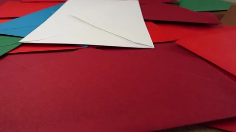Falling multi-colored envelopes. Slow motion. Stock Footage 168652768