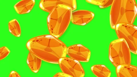 Falling Orange Gemstones and Amber Crystals on Green Screen Background Stock Footage 345197702
