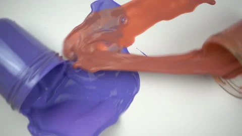 Falling paint jars in slow motion Stock Footage 99841060
