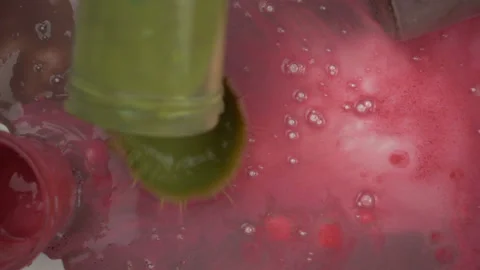 Falling paint jars in slow motion Stock Footage 99841217