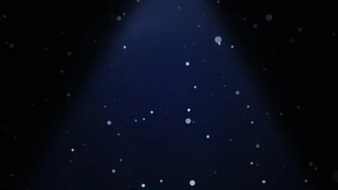 Falling particles with a beam of light Stock Footage 268716731