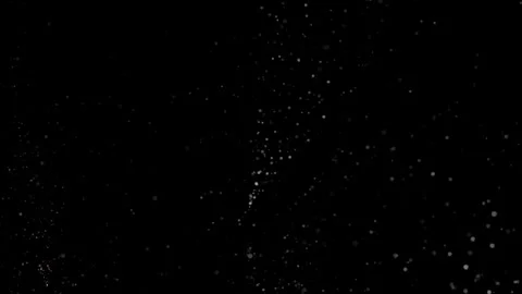 Falling particles on black background | Stock Video | Pond5