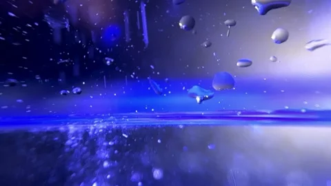Falling particles into water Stock Footage 257477798