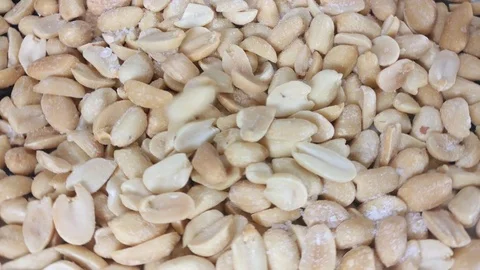Falling peanuts in slow motion Stock Footage 75539604