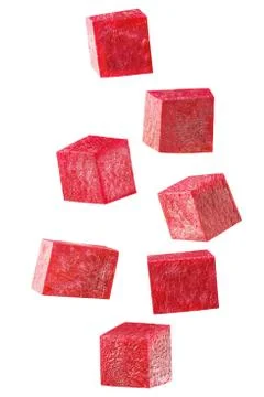 Falling piece of beet isolated on white Stock Photos