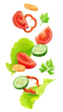 Falling pieces of vegetables Foto stock