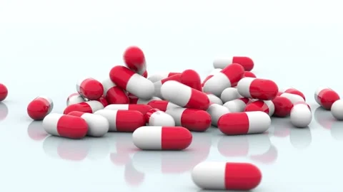 Falling Pill Capsules Stock Footage 139353750