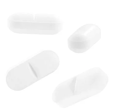Falling Pill isolated on white background, clipping path, full depth of field Stock Photos