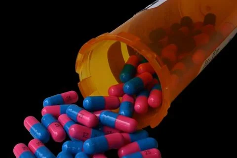 Falling pills Stock Photos