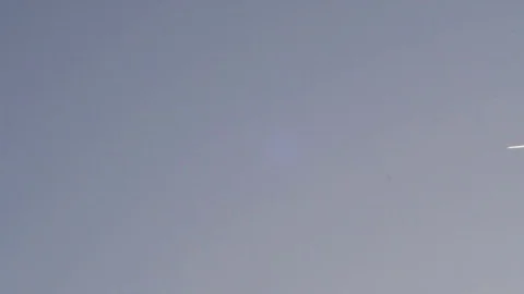 Falling plane high flying Stock Footage 74684333