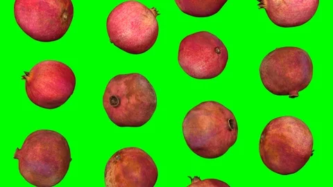 Falling Pomegranates on Green Background (Looping) Stock Footage 93009373