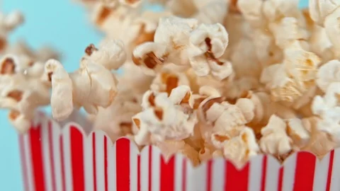 Falling popcorn in super slow motion on ... | Stock Video | Pond5