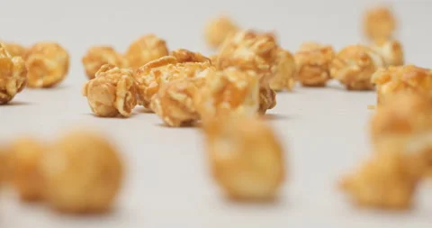 Falling popcorn on white background Video stock 154411907