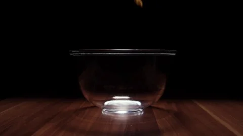Falling Potato Chips Into Bowl 1 Stock Footage 75928684