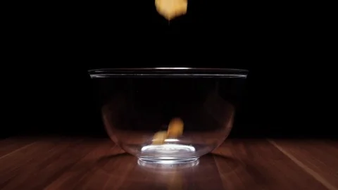 Falling Potato Chips Into Bowl 2 Stock Footage 75928761