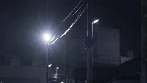 Falling Rain in A City at Night on A Rainy Day Stock Footage 160136052