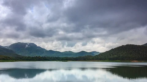 Falling Rain Clouds Over Mountain And Lake 4K Time Lapse (pan shot) Stock Footage 85295821