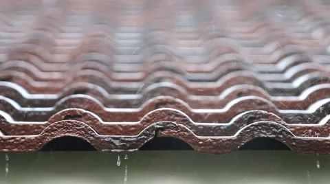 Falling Rain drop on brown brick roof Stock Footage 42619366